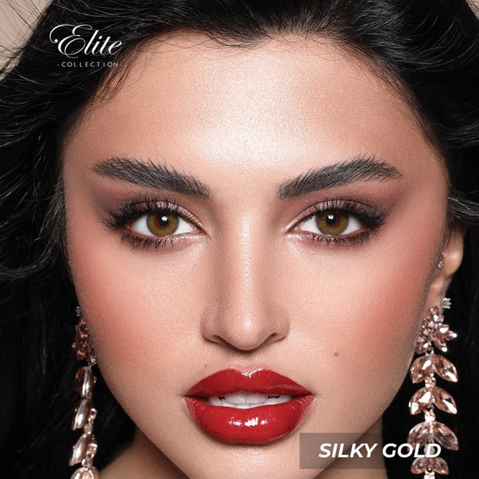 Bella Elite Silky Gold "One pair of contact lenses is accompanied by one complimentary container."